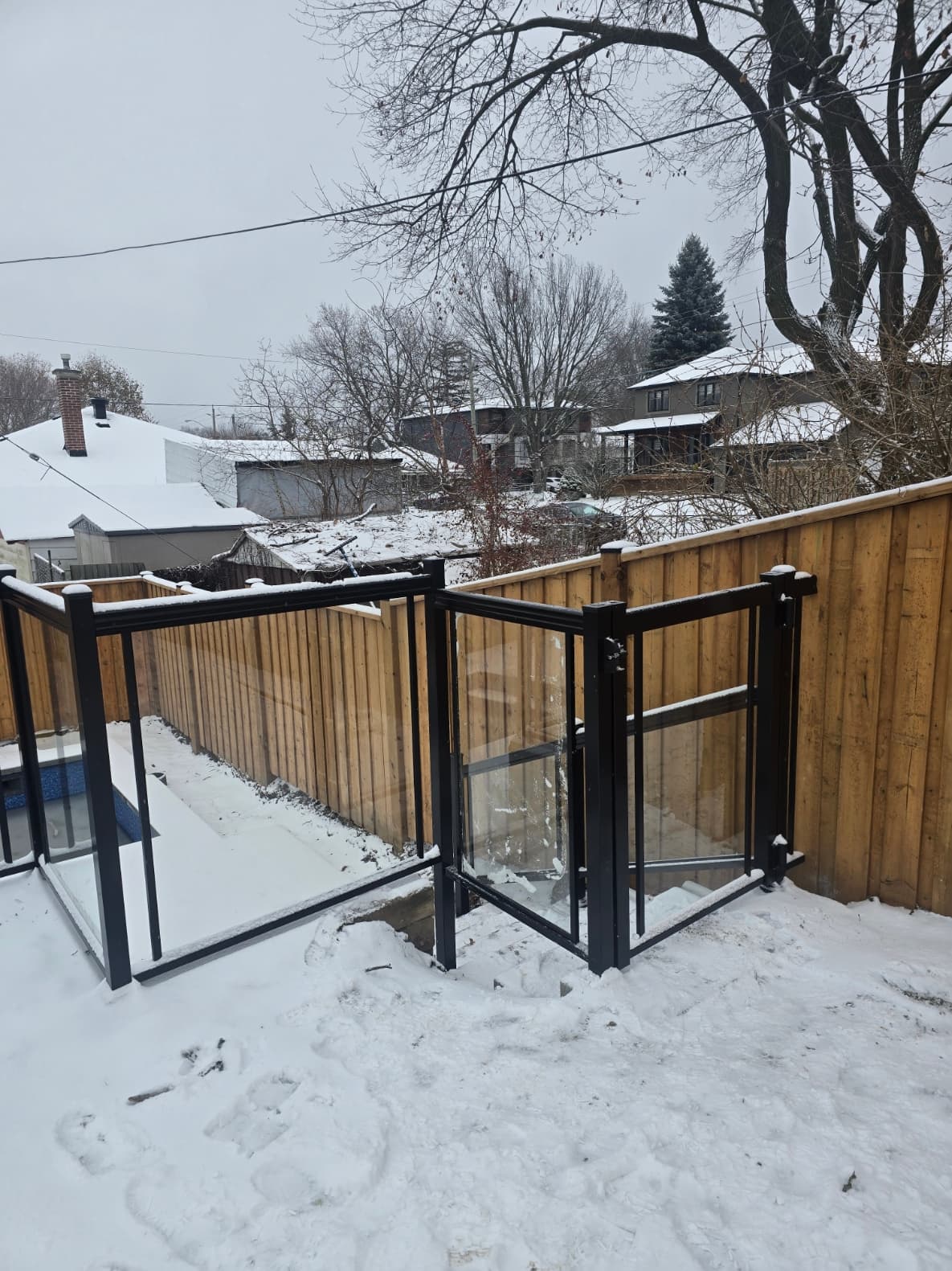 Framed glass railing on stairs