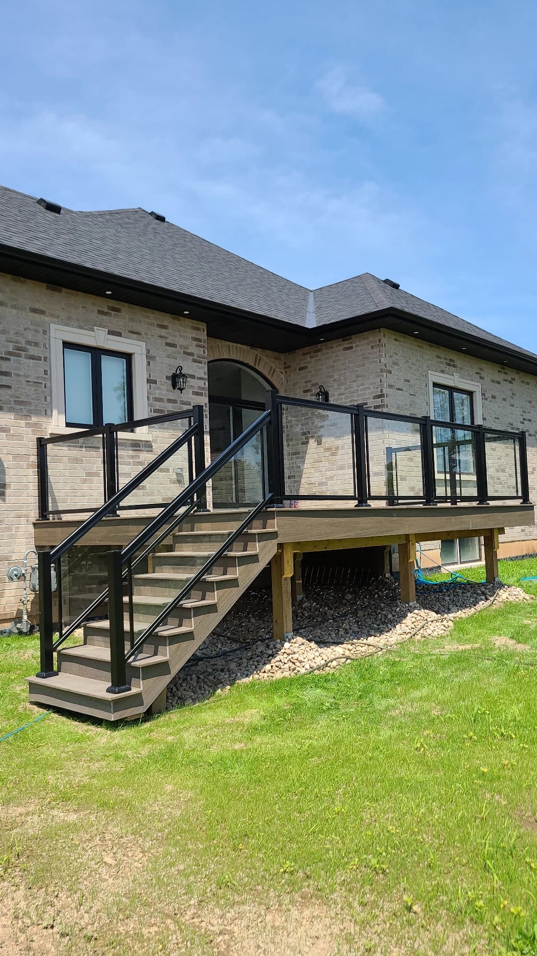Framed glass railing on elevated deck