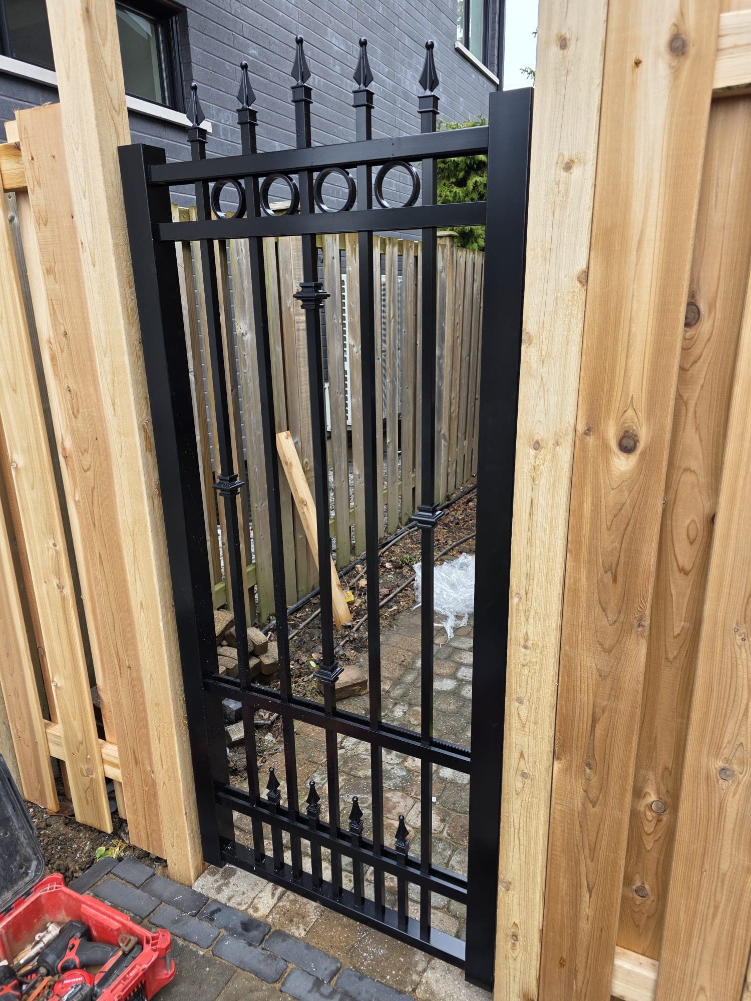Decorative iron gate with finials