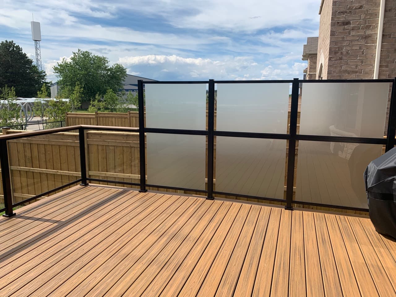 Frosted privacy panels with clear framed glass