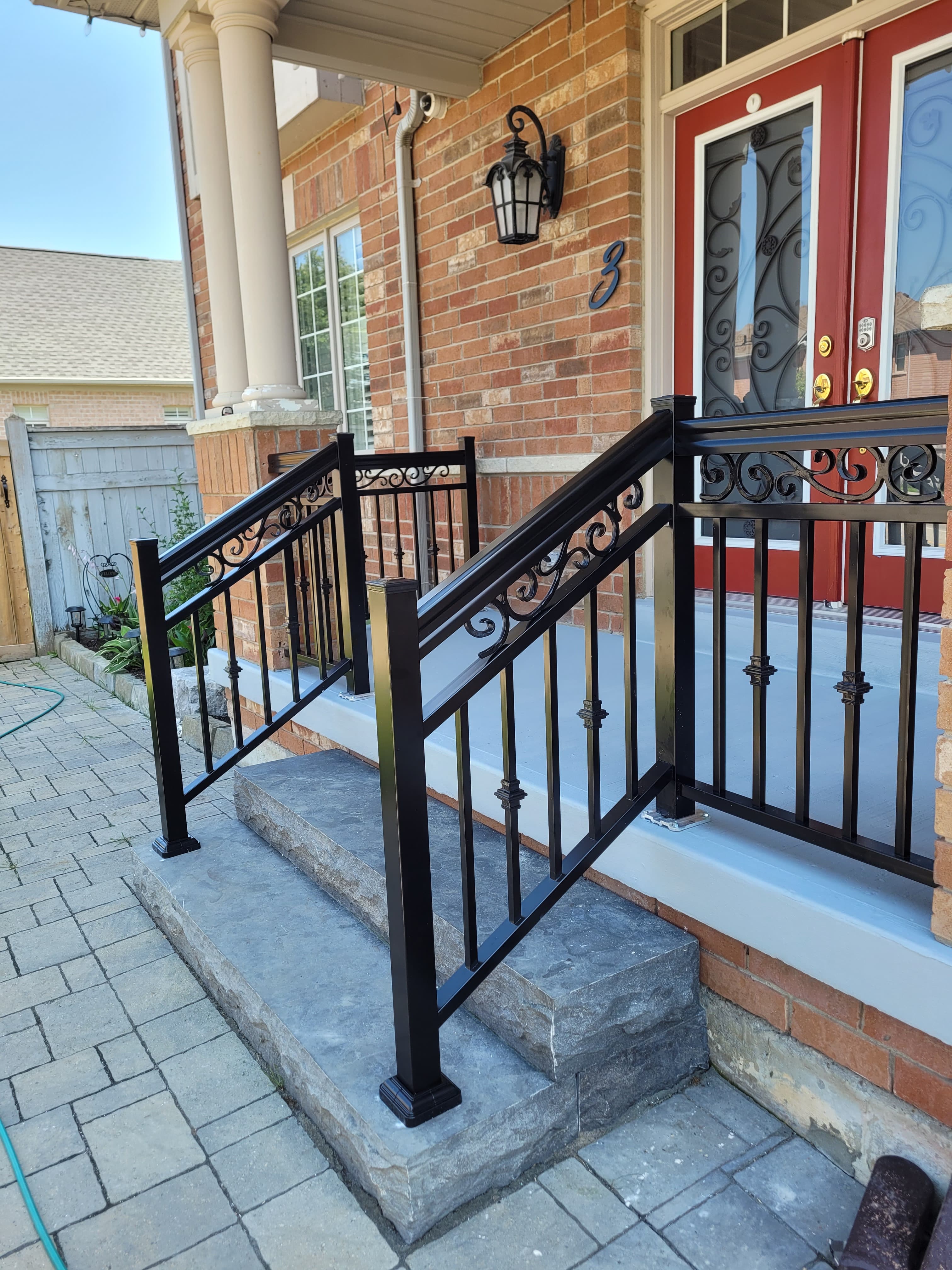Modern black horizontal bar railing on stairs