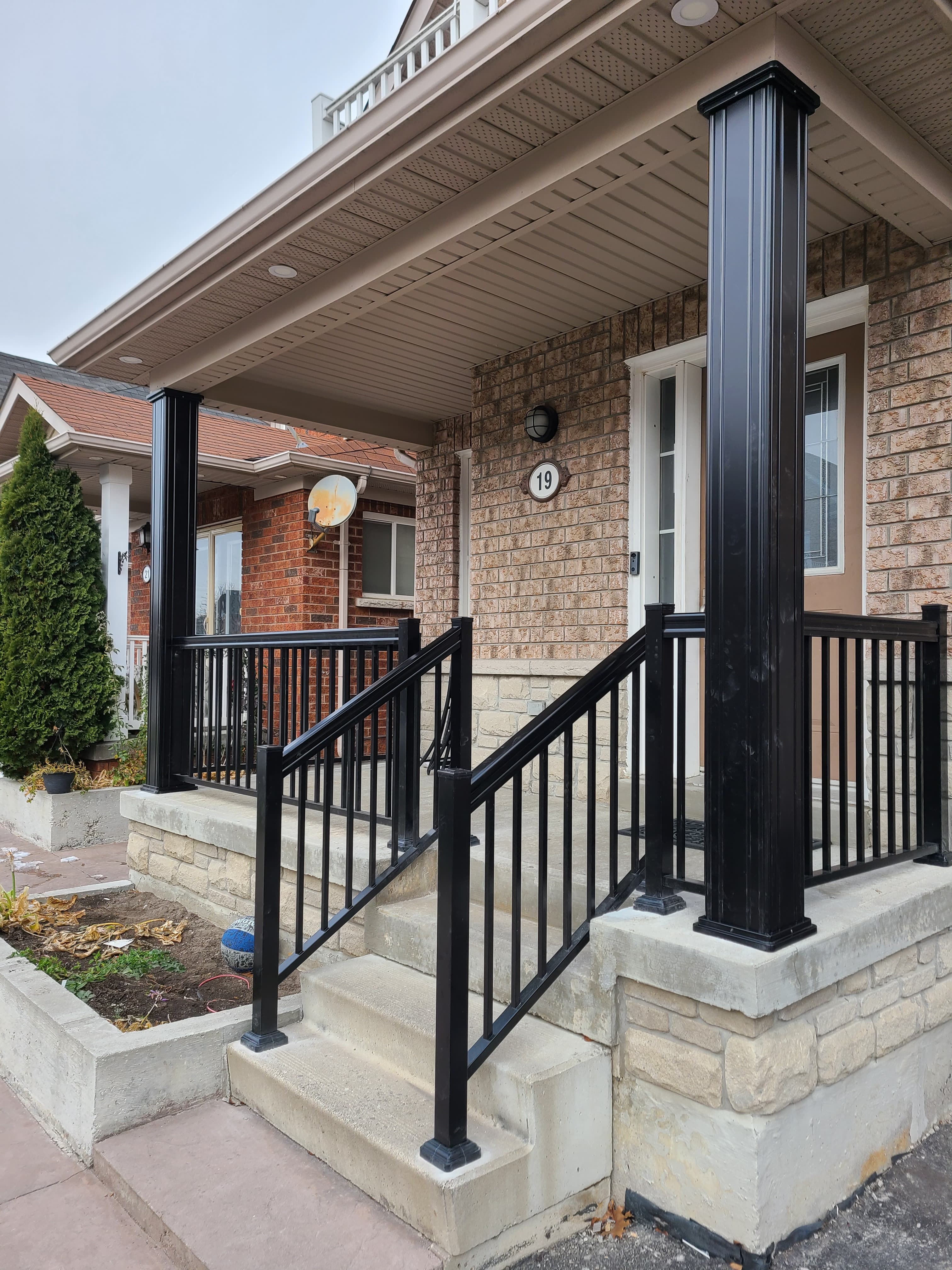 Porch columns with picket railings