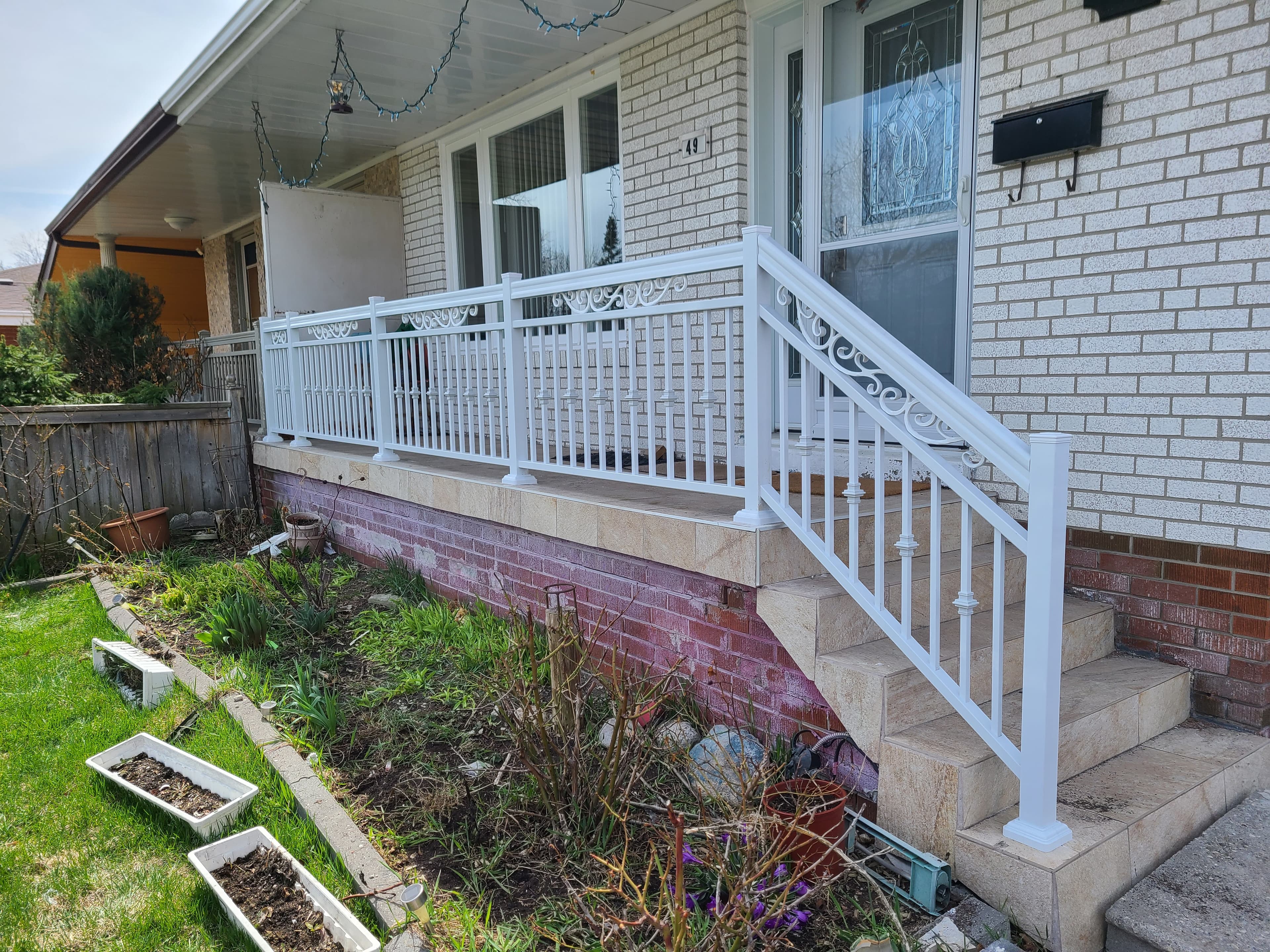 White aluminum railing on residential porch